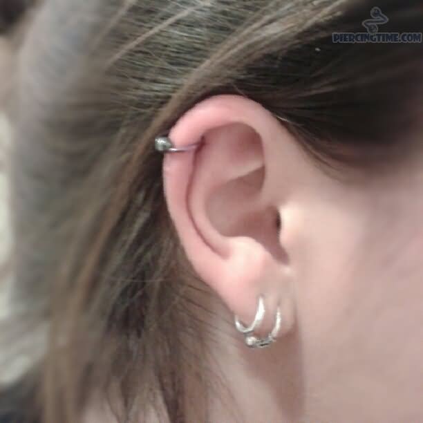 Double Ear Lobe And Rim Piercing
