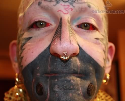 Extreme Face Piercing And Septril Piercing
