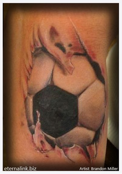 Fabulous Ripped Skin Football Tattoo