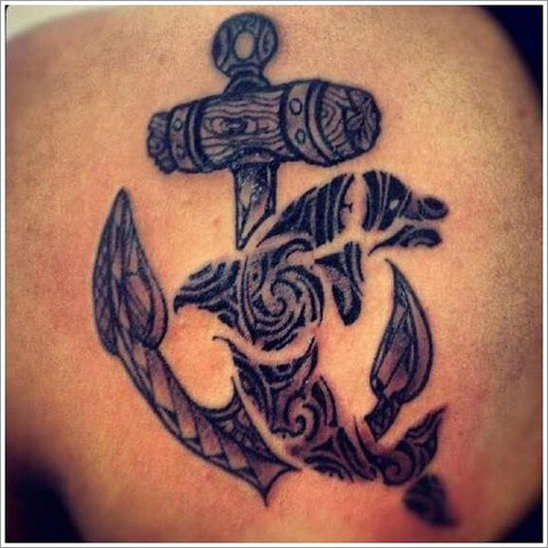 Fantastic Tribal Dolphin With Anchor Tattoo