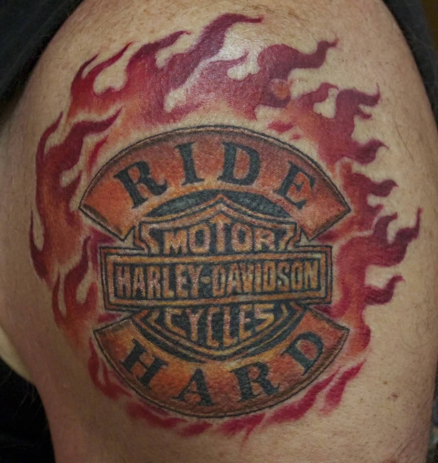 Flaming Harley Davidson Logo Circle Tattoo On Left Shoulder