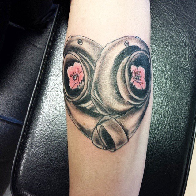 Flower In Heart Shape Turbo Tattoo On Forearm
