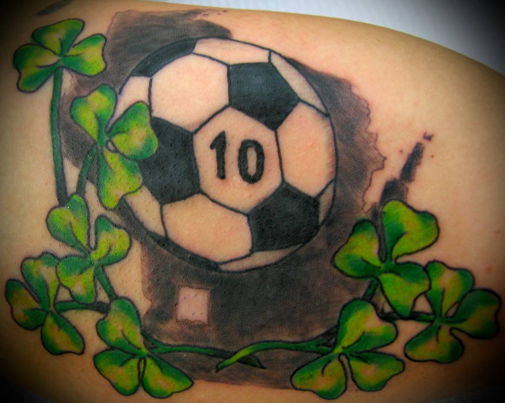 Football Plant Colored Tattoo On Upper Back