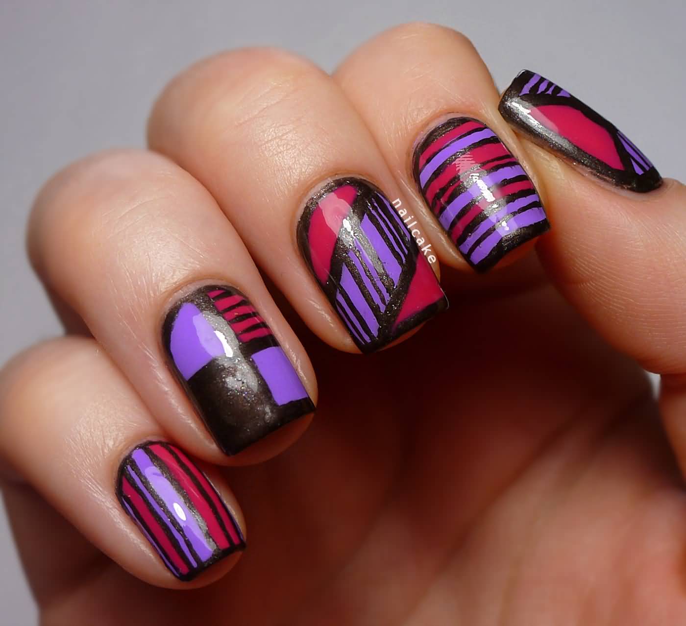 Geometric Purple And Red Pattern Nail Art