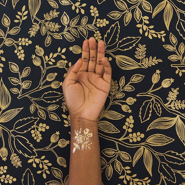 Golden Colored Plant Temporary Tattoo On Wrist
