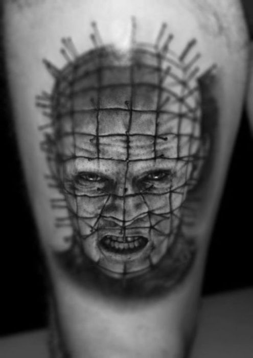 Grey Angry Pinhead Face Tattoo