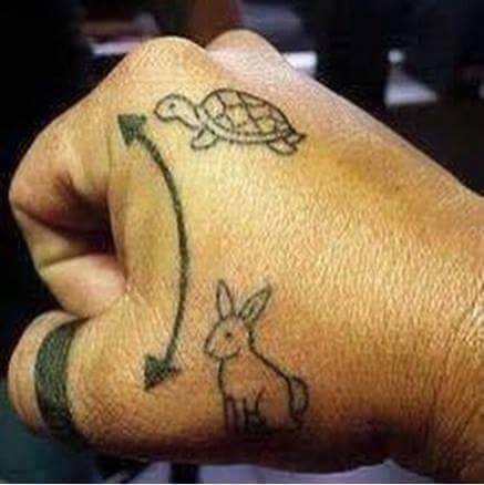 Hare And Tortoise Small Tattoo On Hand