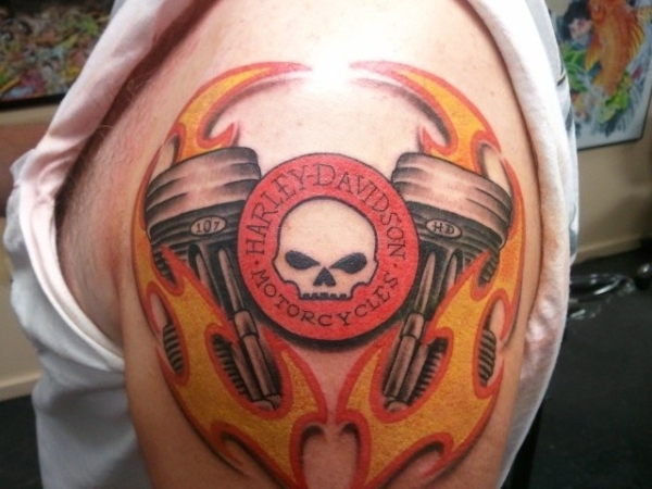 Harley Davidson Tribal Colored Tattoo On Left Shoulder