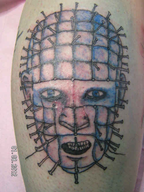 Large Pinhead Face Tattoo