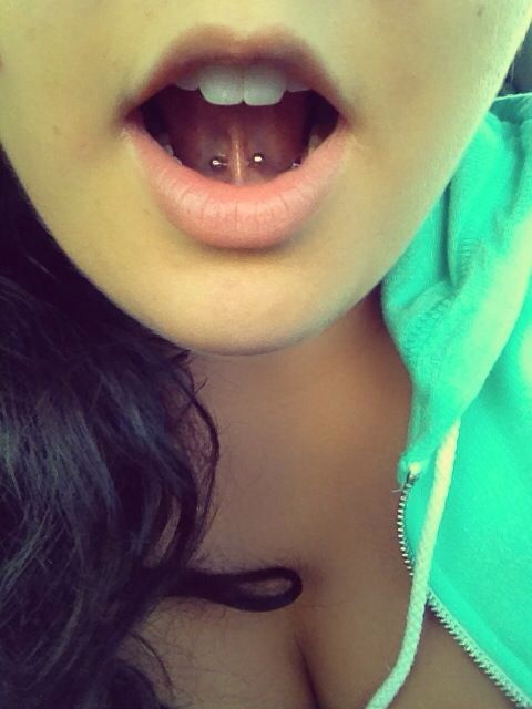 Lingual Frenulum Piercing With Small Curved Barbell