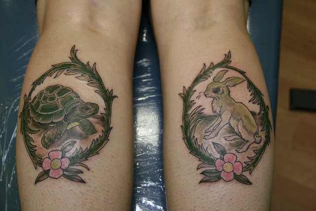 Lovely Tortoise And Hare Tattoos On Arms