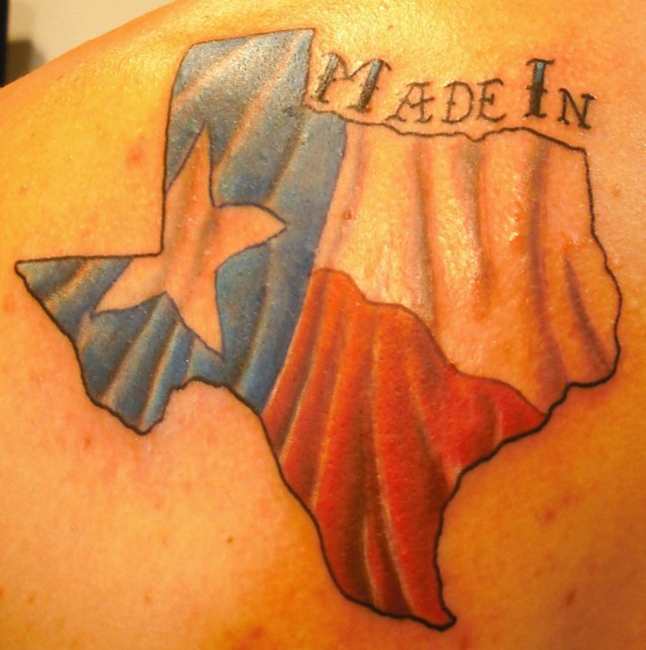 Made In Text With Texas Flag In Map Tattoo On Back