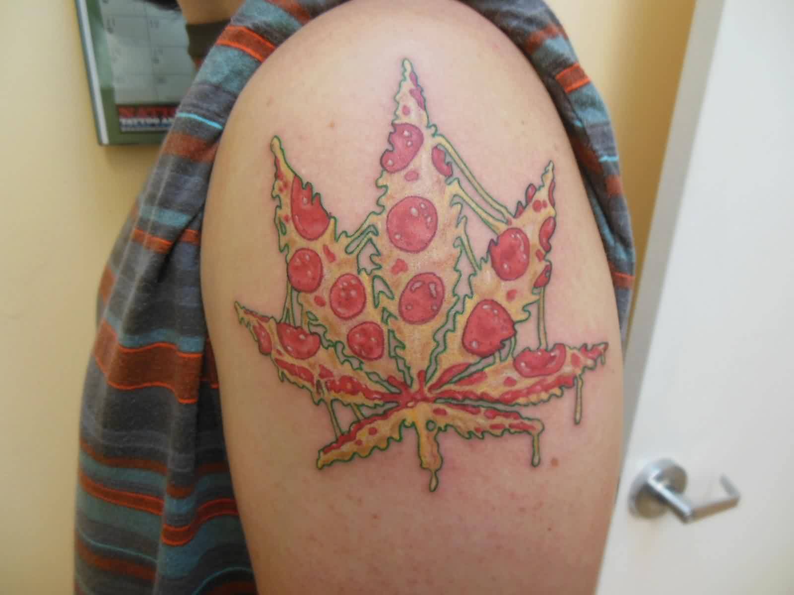 Maple Leaf Shape Pizza Tattoo On Left Shoulder