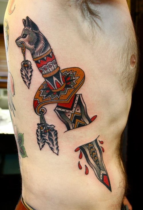 Native America Traditional Dagger Ripped Skin Tattoo On Side Rib
