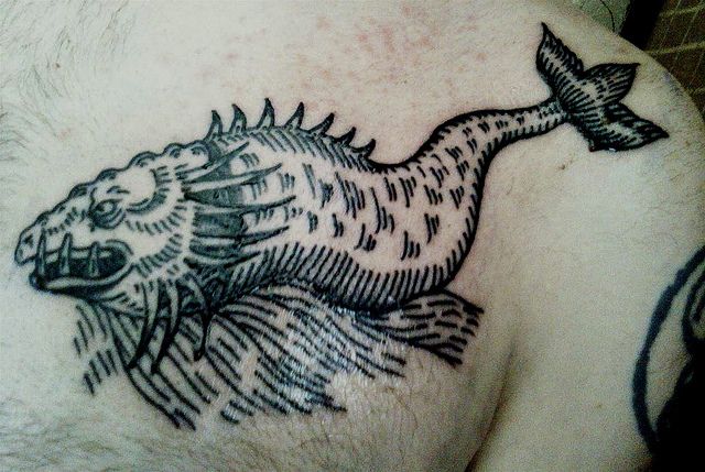 Nice Fish Monster Tattoo On Back