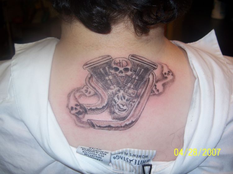 Nice Grey Ink Skulls And Harley Engine Tattoo For Girls