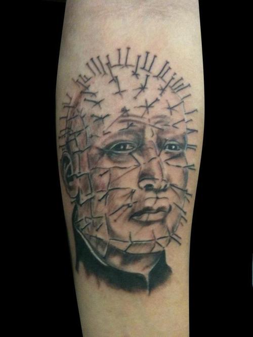 Nice Grey Pinhead Tattoo On Forearm