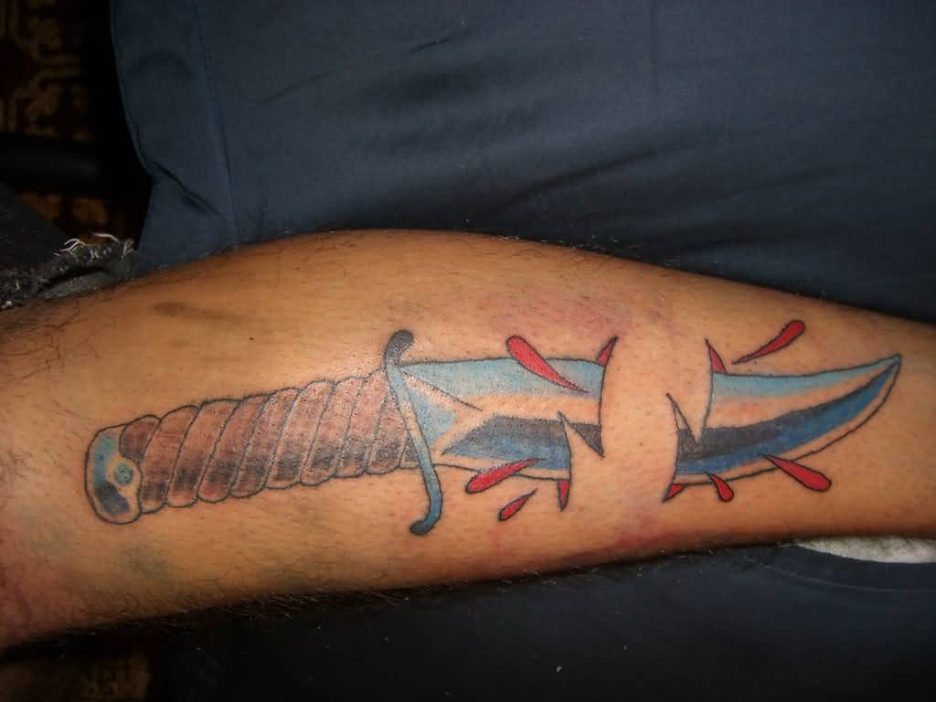Nice Knife Ripped Skin Tattoo On Arm