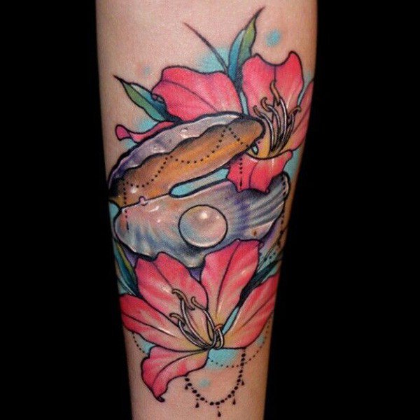 Nice Seashell With Flowers Tattoo On Arm