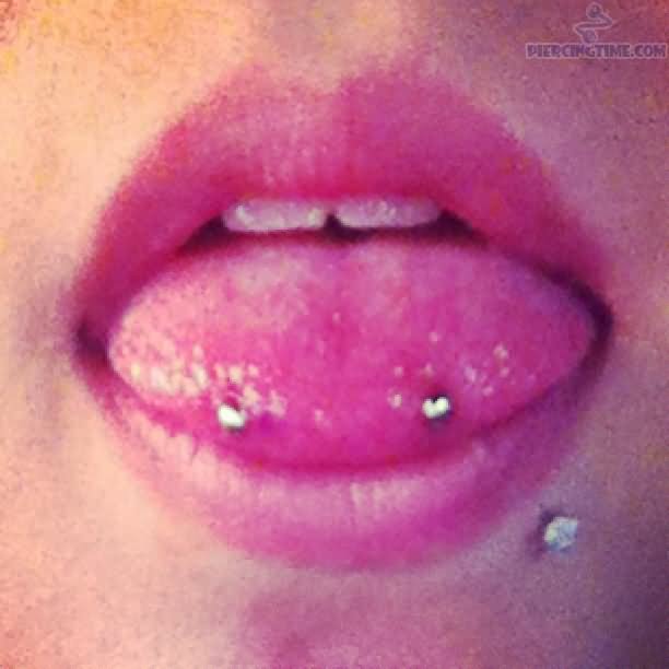 Nice Snake Eyes Piercing With Silver Barbell