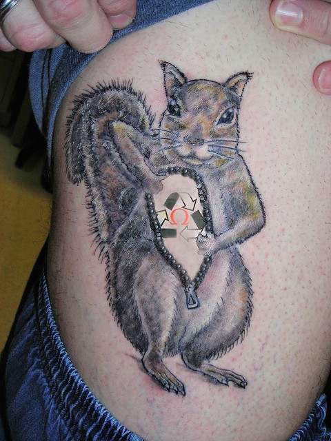 Nice Squirrel Zipper Tattoo On Side Rib