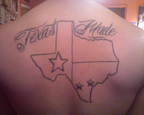 Nice Texas Made Texts With Map Tattoo On Upper Back