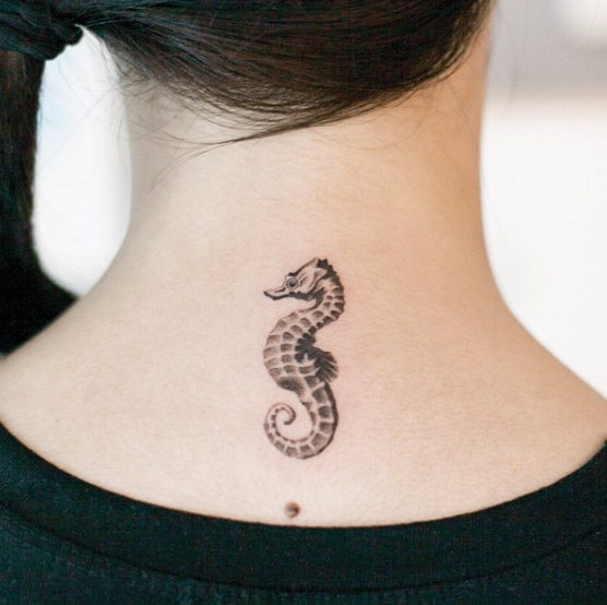 Nice Tiny Seahorse Tattoo On Nape By River