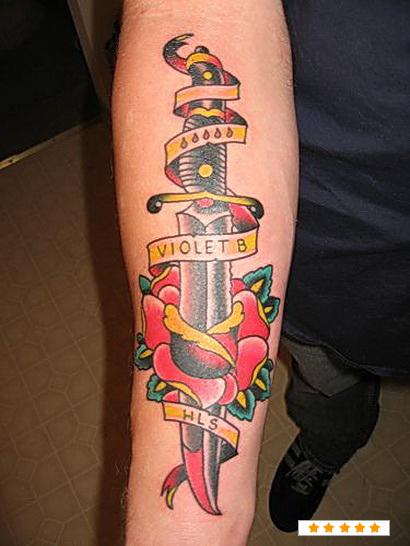 Nice Traditional Knife Ripped Flower Tattoo On Forearm