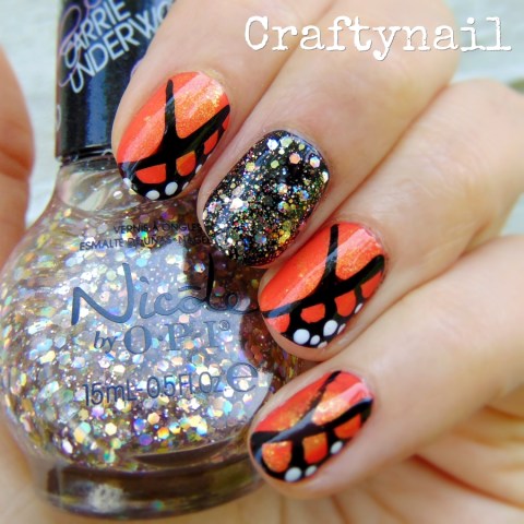 Orange Butterfly Wings Nail Art With Accent Glitter Design
