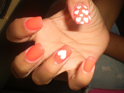 Orange Nails With White Hearts Nail Art Design Idea