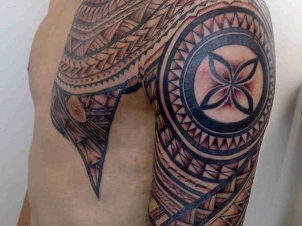 Outstanding Samoan Tattoo On Left Sleeve And Chest