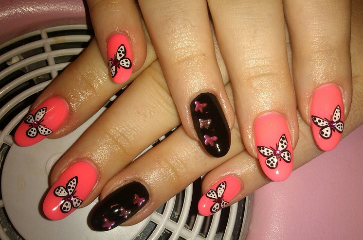 Peach Base Nails With White Butterfly Nail Art With Rhinestones Design Idea