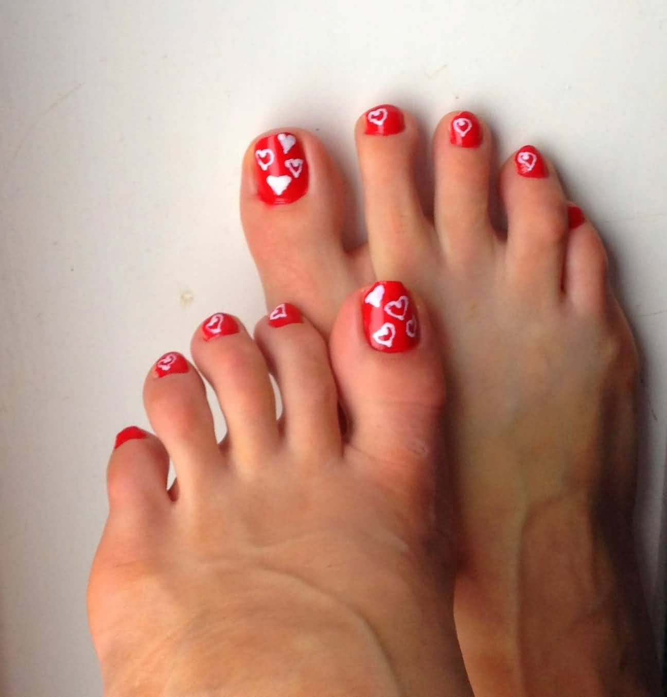 Pink Toe Nails With White Hearts Nail Art Design Idea