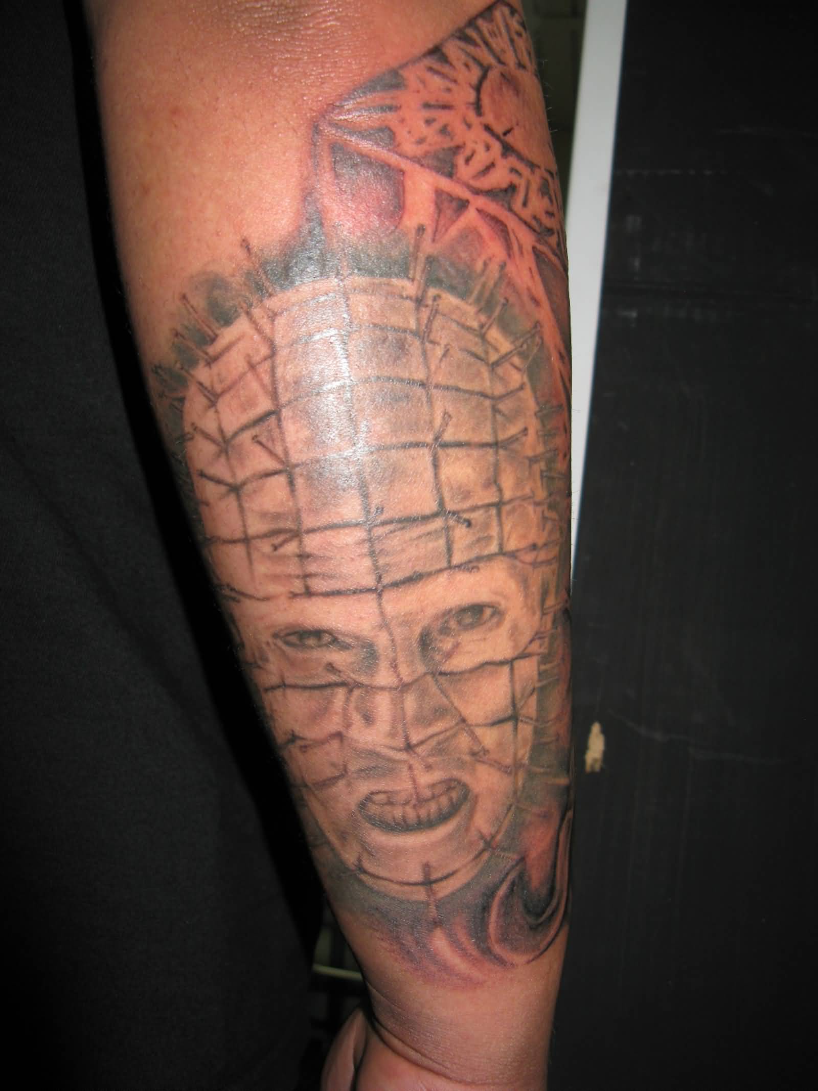 Realistic Colored Pinhead Tattoo On Arm