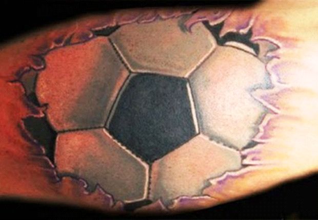 Realistic Football Ripped Skin Tattoo