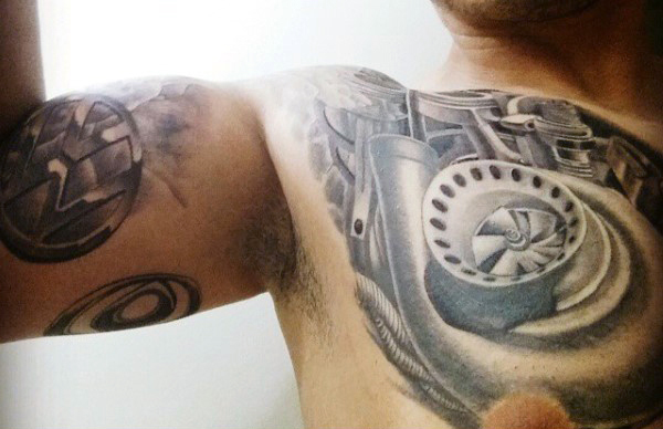 Realistic Grey Turbo Tattoo On Chest For Men