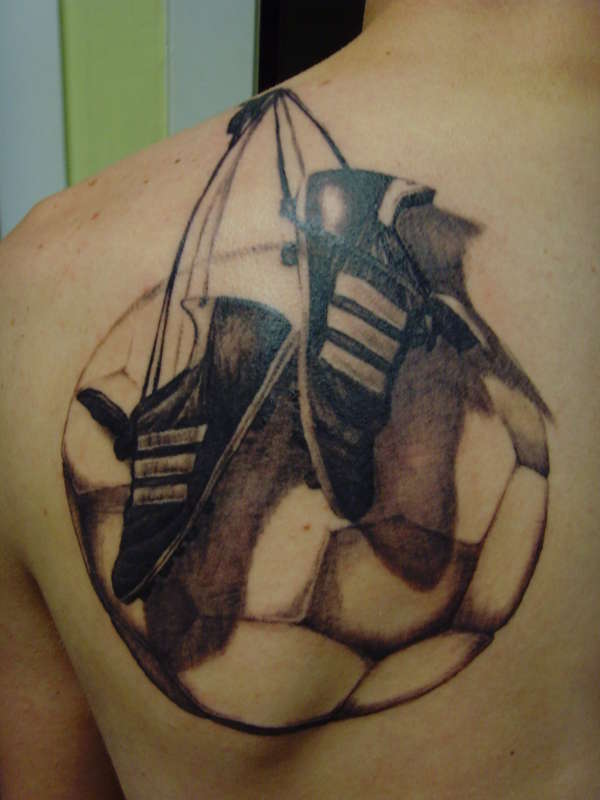 Realistic Hanged Boots And Football Tattoo On Left Back Shoulder