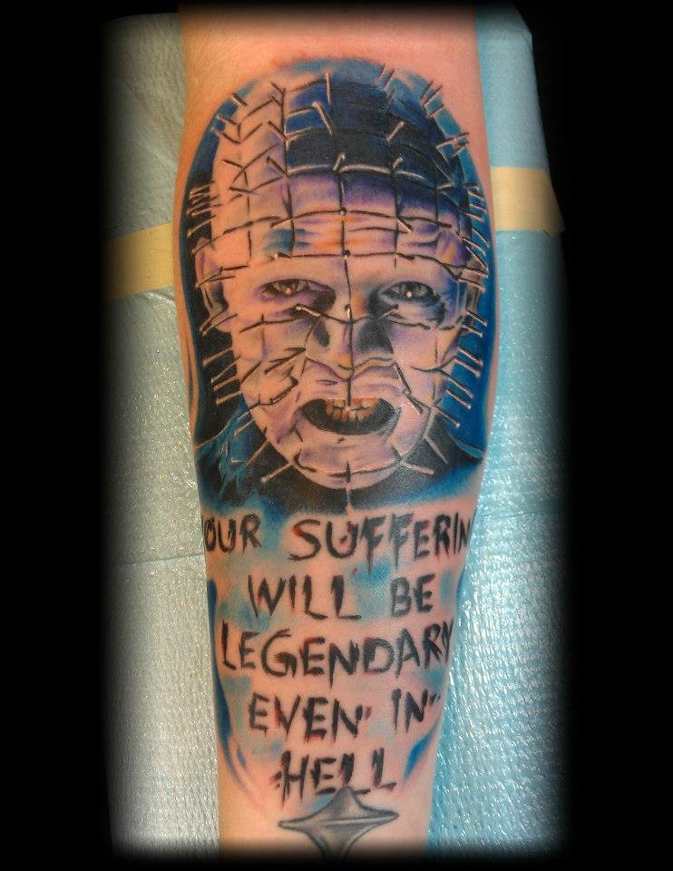 Realistic Pinhead With Lettering Tattoo On Arm