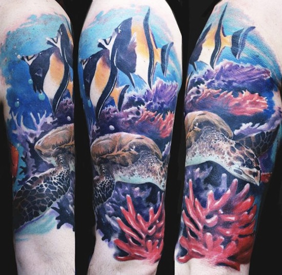 Realistic Turtle And Fishes In Sea Colored Tattoo On Half Sleeve