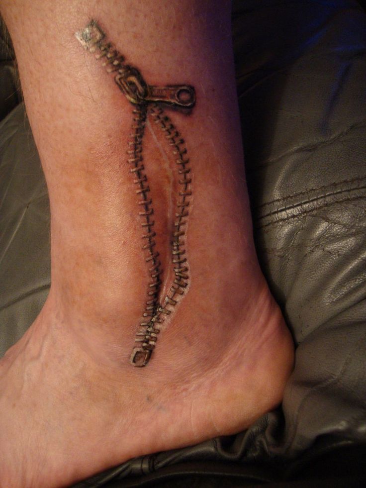 Realistic Zipper Scar Tattoo On Lower Leg