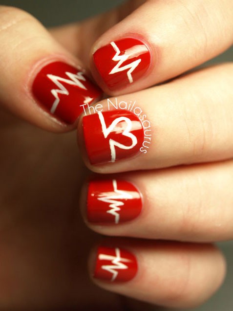 Red Nails With White Heart Beat Design Nail Art