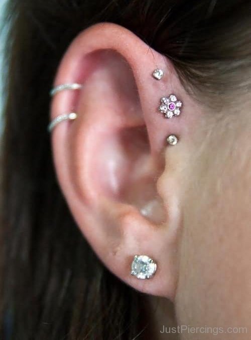 Right Ear Lobe And Rim Piercing Picture For Girls