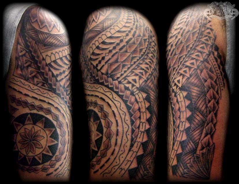 Samoan Tribal Tattoo On Left Half Sleeve For Men