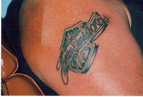 Shinning Harley Davidson Logo Tattoo On Left Shoulder