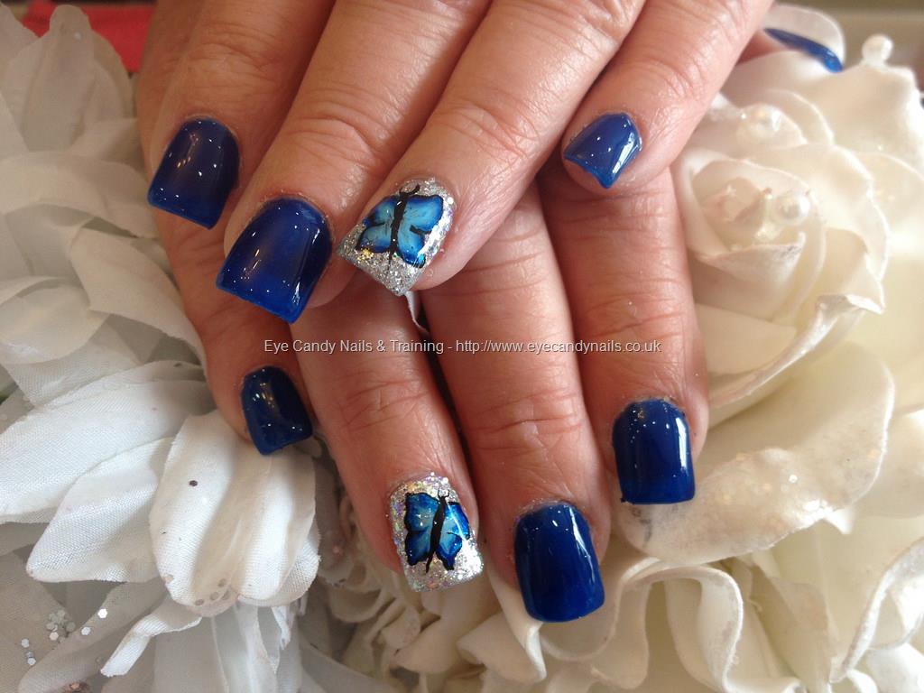 Silver Glitter Nails With Blue Butterflies Nail Art