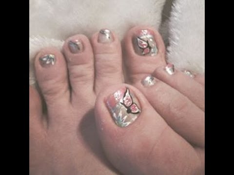 Silver Toe Nails With Pink Butterfly Nail Art