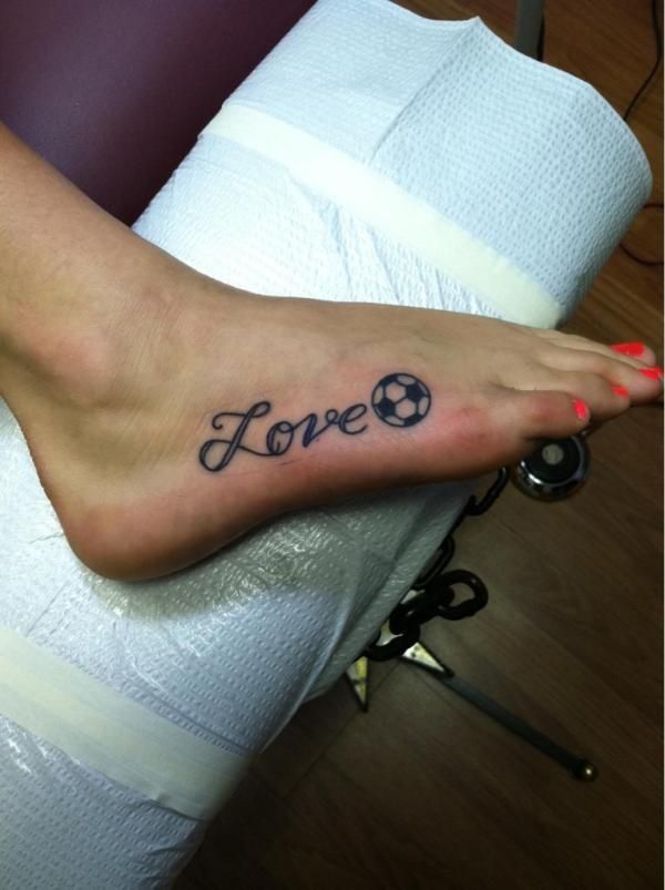 Simple Love Football Tattoo On Foot
