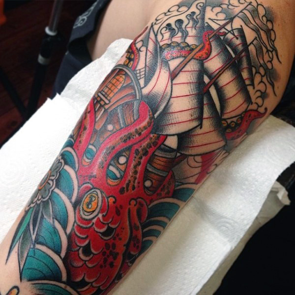 Simple Octopus And Seaship Colored Tattoo