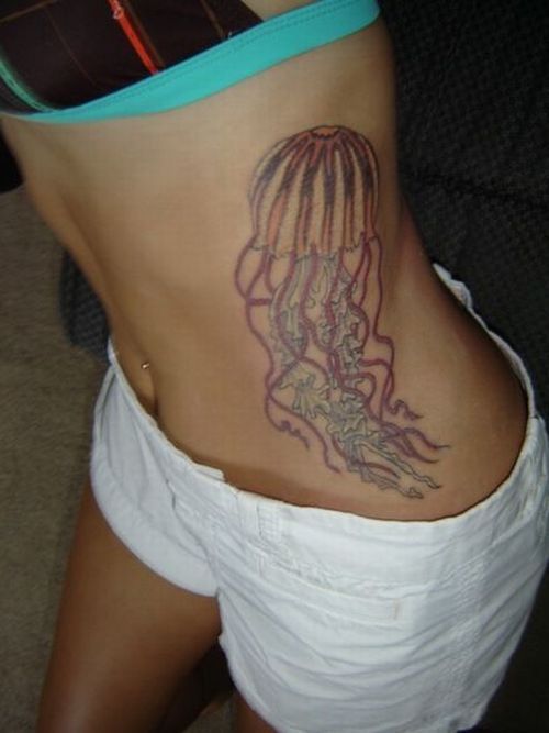 Simple Octopus Tattoo On Side Rib
