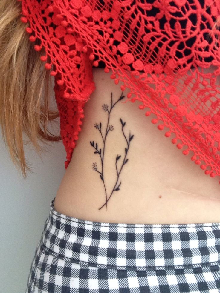 Simple Plant Tattoo On Back Lower Waist